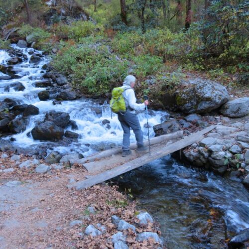 Crossing stream during Langtang Trek